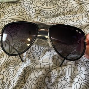 Quay aviators like new, comes with case and cloth to clean